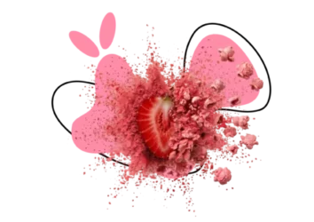 fraise avec effet d’explosion de poudre rose sur fond abstrait
